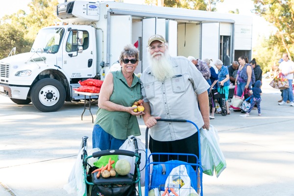 Elderly couple at Feeding San Diego mobile food pantry in Alpine