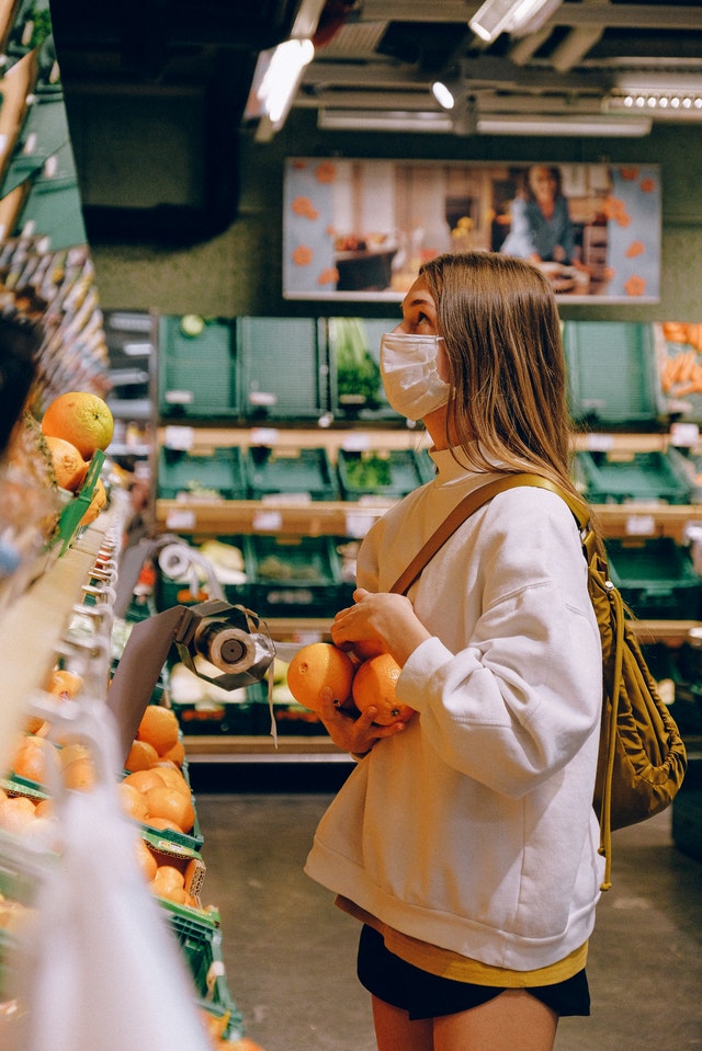 Woman shopping at grocery store