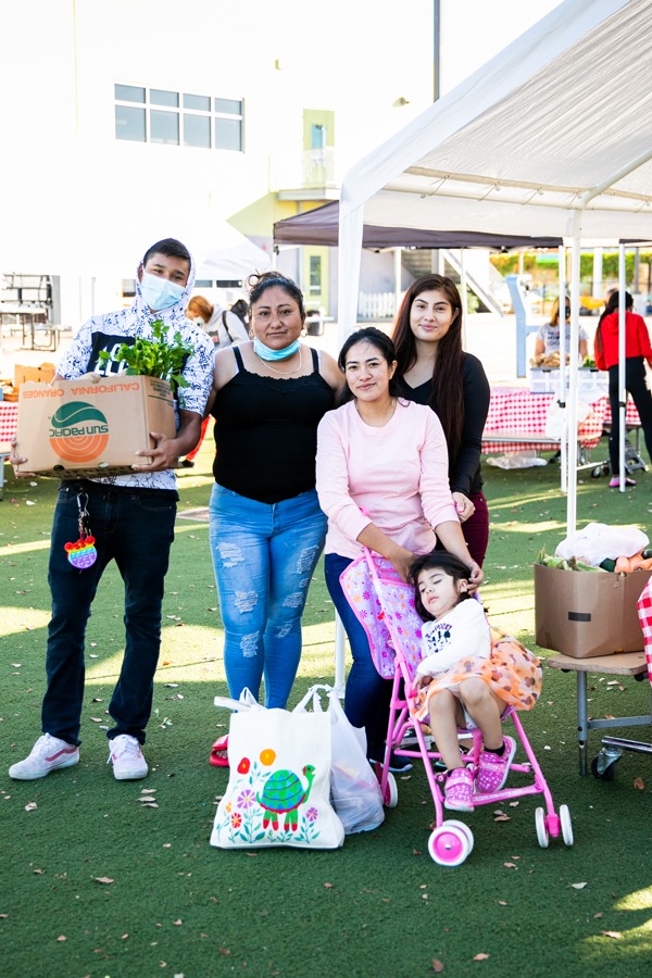 Family at Feeding San Diego free food distribution