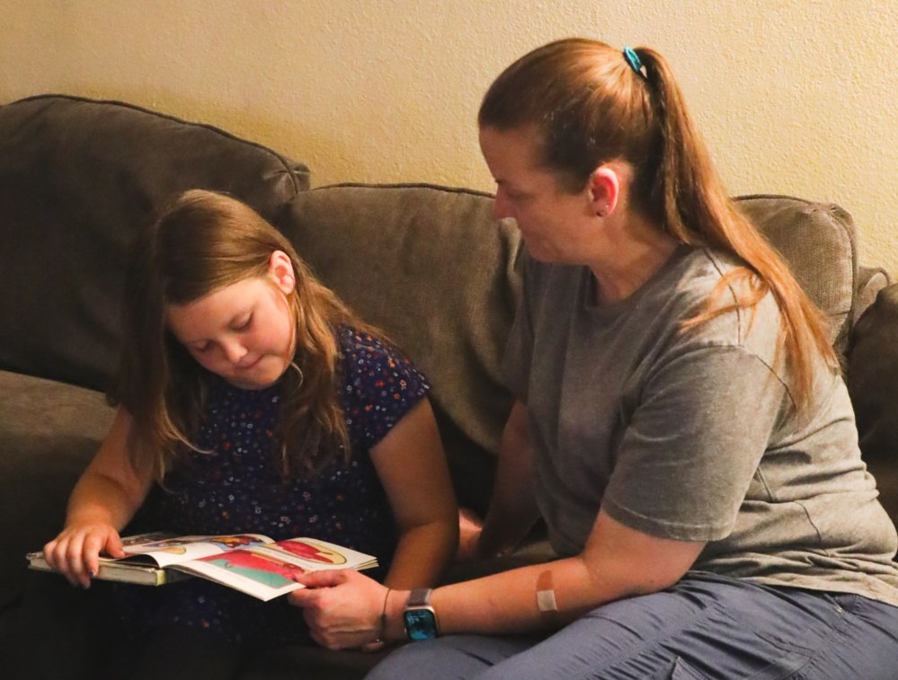 Feeding San Diego food recipient Melissa and her daughter Zoey (age 6) in their home