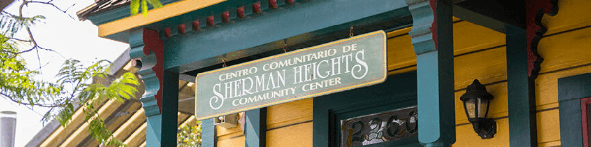 A sign which says "Centro Comunitaro De Sherman Heights Community Center"