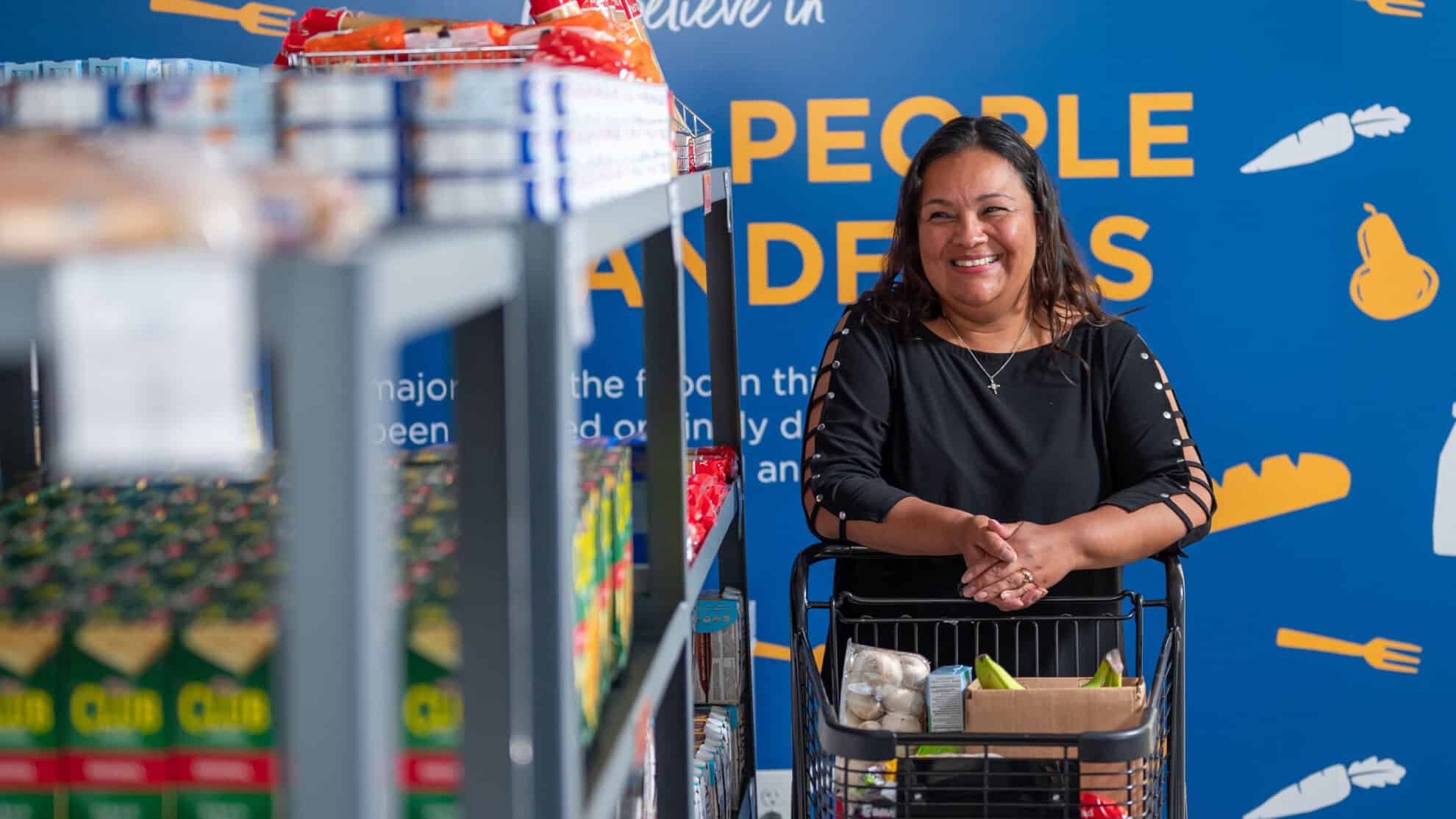 Woman in Feeding San Diego Marketplace