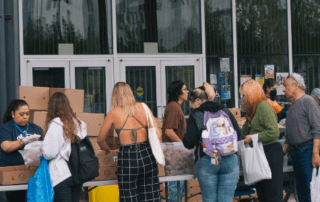 A line of people at a college pantry