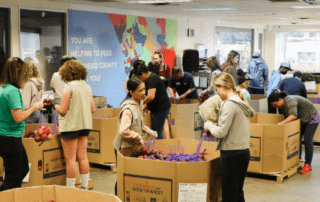 Volunteers in Feeding San Diego's distribution center