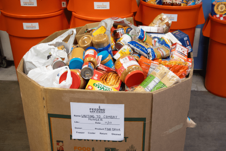 A tote full of food from a food drive